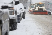 cars and snow plow