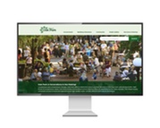 New Village website on computer monitor