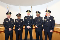 Nathaniel Leitl with command staff after being sworn in as Commander