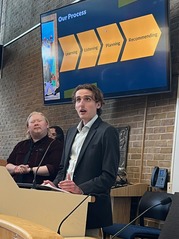 UIC graduate students presenting at Village Hall