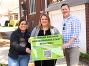 Neighborhood and Development Services staff with CDBG sign as part of National Community Development Week