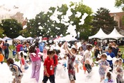 Kids playing in foam at A Day in Our Village