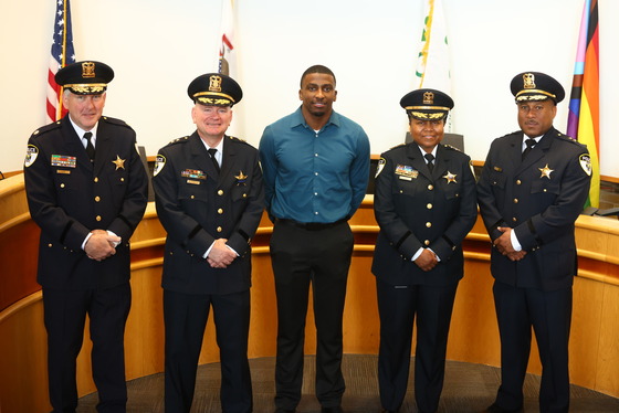 Police Officer Tristen Tanner with command staff after being sworn in on May 27, 2025.