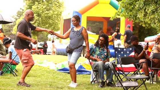 Couple dancing during 2024 Juneteenth community cookout