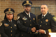 Sergeant Derrick Verge receives Police Medal of Valor from the Illinois Association of Chiefs of Police 