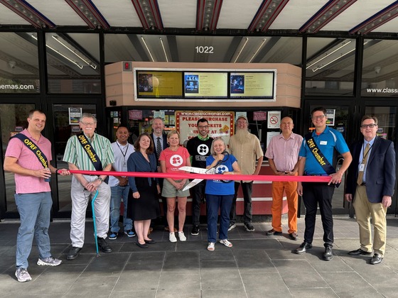 Village staff attends a ribbon cutting for the Oak Park IL Film Festival at Lake Theatre