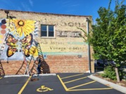 A new mural being installed along North Avenue in October 2025.