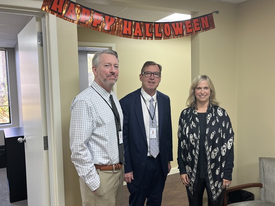 Michael Mertes, John Melaniphy and Cindy Hansen from the Economic Vitality team at the new Economic Vitality office.