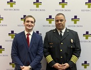 Firefighter/Paramedic Colin Duggan with Chief JT Terry at his paramedic graduation