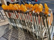 Construction barriers lined up on a sidewalk in Oak Park