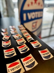 "I voted" early voting stickers at Village Hall