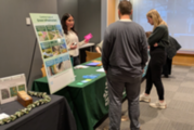 Sustainability Analyst Alina Dekirmenijan talks to attendees at the 2026 Planting in the Parkway workshop
