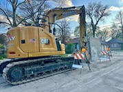 Equipment staged for alley sewer repairs between Lombard and Taylor Avenues