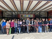 Community members celebrate Lake Theatre's 90th anniversary.