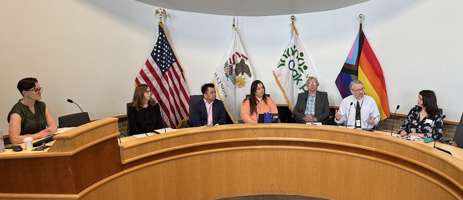 Panelists participate in a National Small Business Week panel discussion at Village Hall.