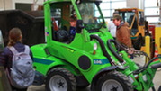 Families check out Village equipment at the Public Works Center.