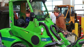 Families check out Village equipment at the Public Works Center.