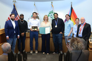 Olympic medalist Emery Lehman is recognized by the Village Board for his accomplishments on May 19, 2026.