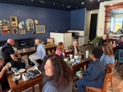 Community members meet with public safety personnel from various departments at an ECHO Exchange event at Wise Cup.