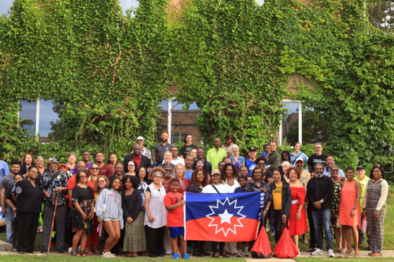 Community members attend the Juneteenth flag-raising ceremony on June 10, 2026.