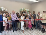Ribbon-cutting ceremony for Lumi Skin Studio on Marion Street