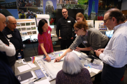 Community members participate in a discussion about Village Hall renovations.