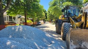 Construction equipment on Scoville Avenue just south of Rehm Park during the 2026 water & sewer project.