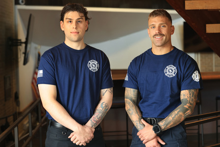 Vincent Berardino and Anthony Gigovski stand after being sworn in as probationary firefighter/paramedics