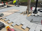 Brick paver installation along Oak Park Avenue as part of the Renew the Avenue project.