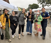 Firefighter/paramedic Savannah Reinhart with 2026 Farmers' Market Pie Bake-Off contestants and judges