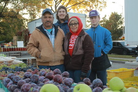 Vendors selling fall produce at the Oak Park Farmers' Market