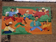 A mural created in 2026 as part of the North Avenue Mural Project
