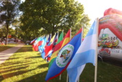 Flags lined up on the south lawn at Village Hall for Hispanic Heritage Month