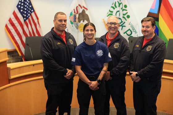 New Firefighter/Paramedic Nova Sinskul with Fire Department leadership after being sworn in on Oct. 16, 2026 at Village Hall.