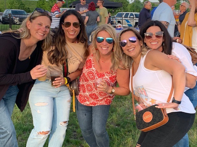 group of women with bevs at Venue