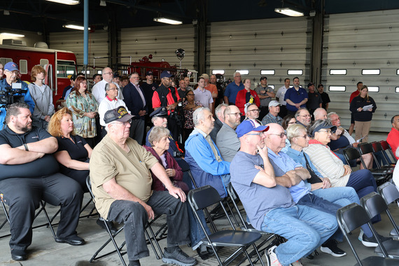 Crowd of community members take in a speech at the Peoria Fire Department's 150 Year Anniversary Celebration