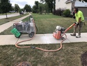Grinding concrete for Sidewalk Trip Hazard Removal Program