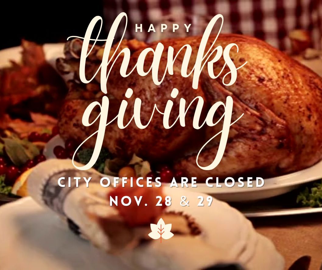 A spread of dishes on a dining table for Thanksgiving.