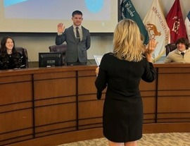 Mayor Lora Vitek swears in a student to serve as "Mayor for a day" during the "Government for a Day Program."