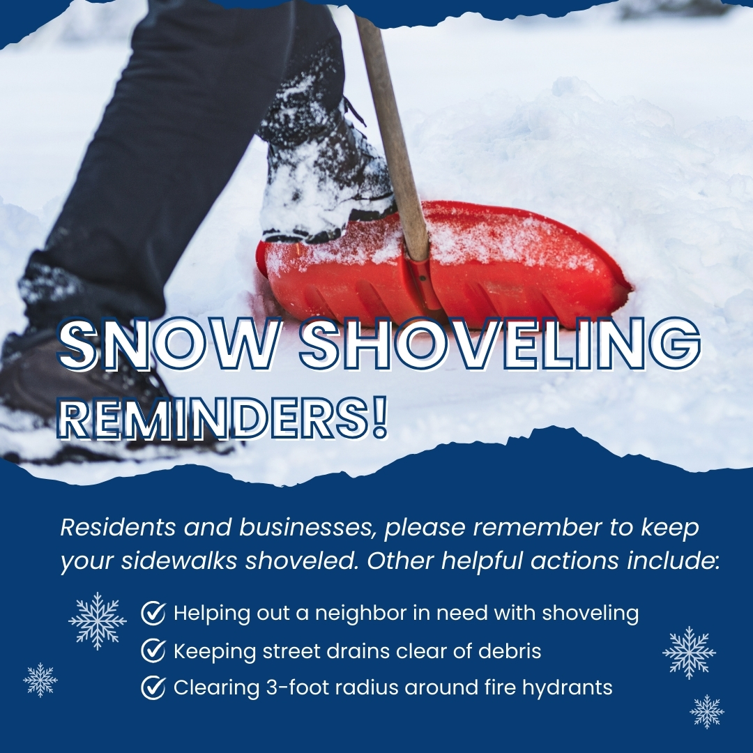 A close-up of a person with a snow shovel.