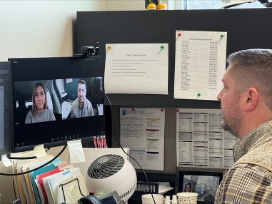 An image of two people on a Zoom call for an interview.