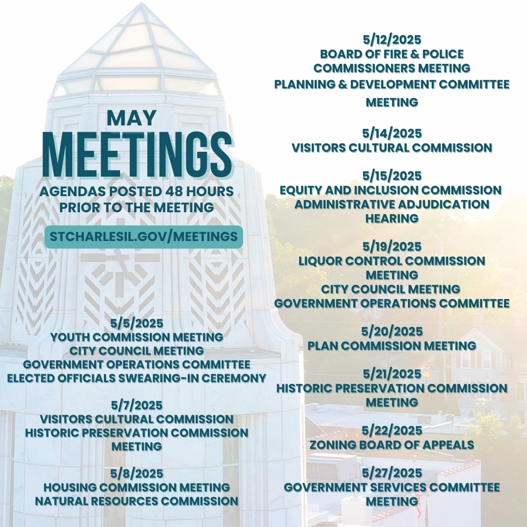 Municipal building tower with dates of meetings.