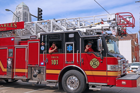 A firetruck goes by during the parade