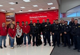 Target staff and officers pose for a photo
