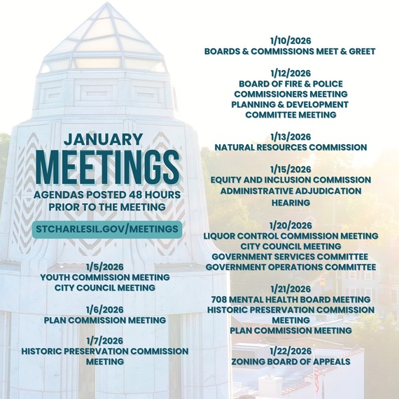 Municipal building tower at dusk with a listing of January meetings.