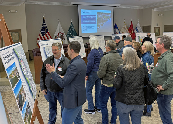 A crowd gathers in council chambers to discuss options for the former police station site along the riverfront.