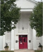 The red front doorway to Lazarus House.
