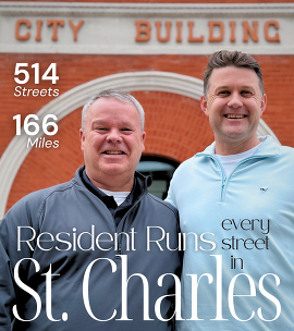A St. Charles resident is congratulated by the mayor for completing a running challenge.