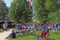 A crowd gathers for the Memorial Day ceremony at the Freedom Shrine.