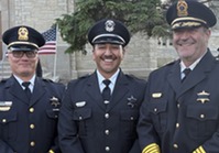 Officers attend a memorial ceremony.